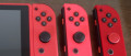 Image Comparaison des trois Joy-Con rouges de la Nintendo Switch